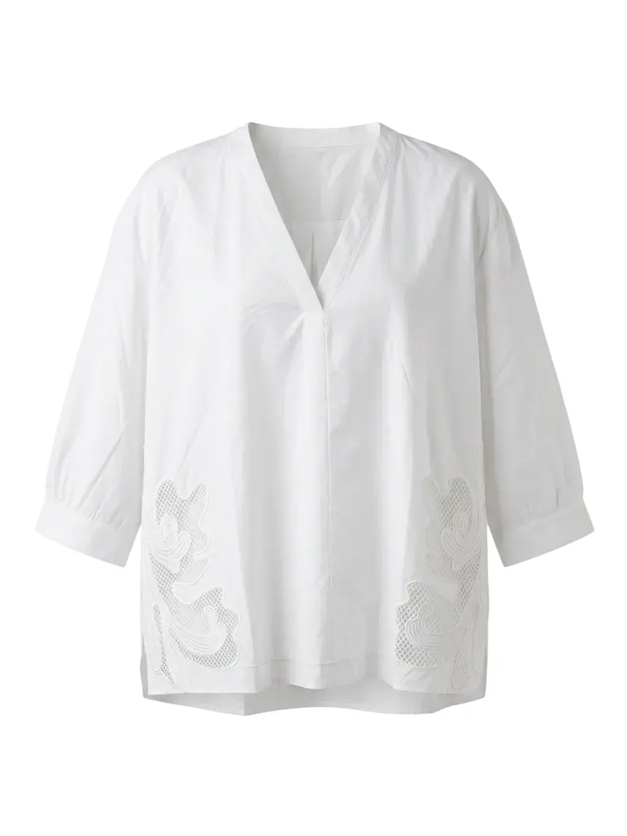 Blusa con ricamo